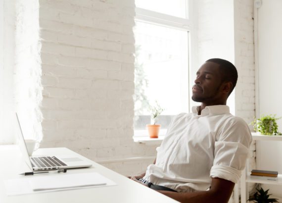 Mindfulness in the workplace can be as simple as taking a moment to breathe.