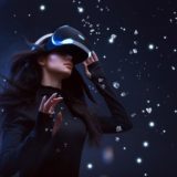 Woman uses a VR headset in the metaverse.