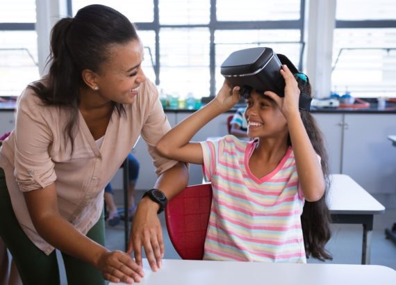 Mother and daughter explore a VR world together. 