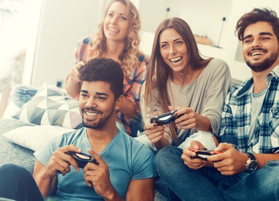 A group of friends plays a online multiplayer game together. 