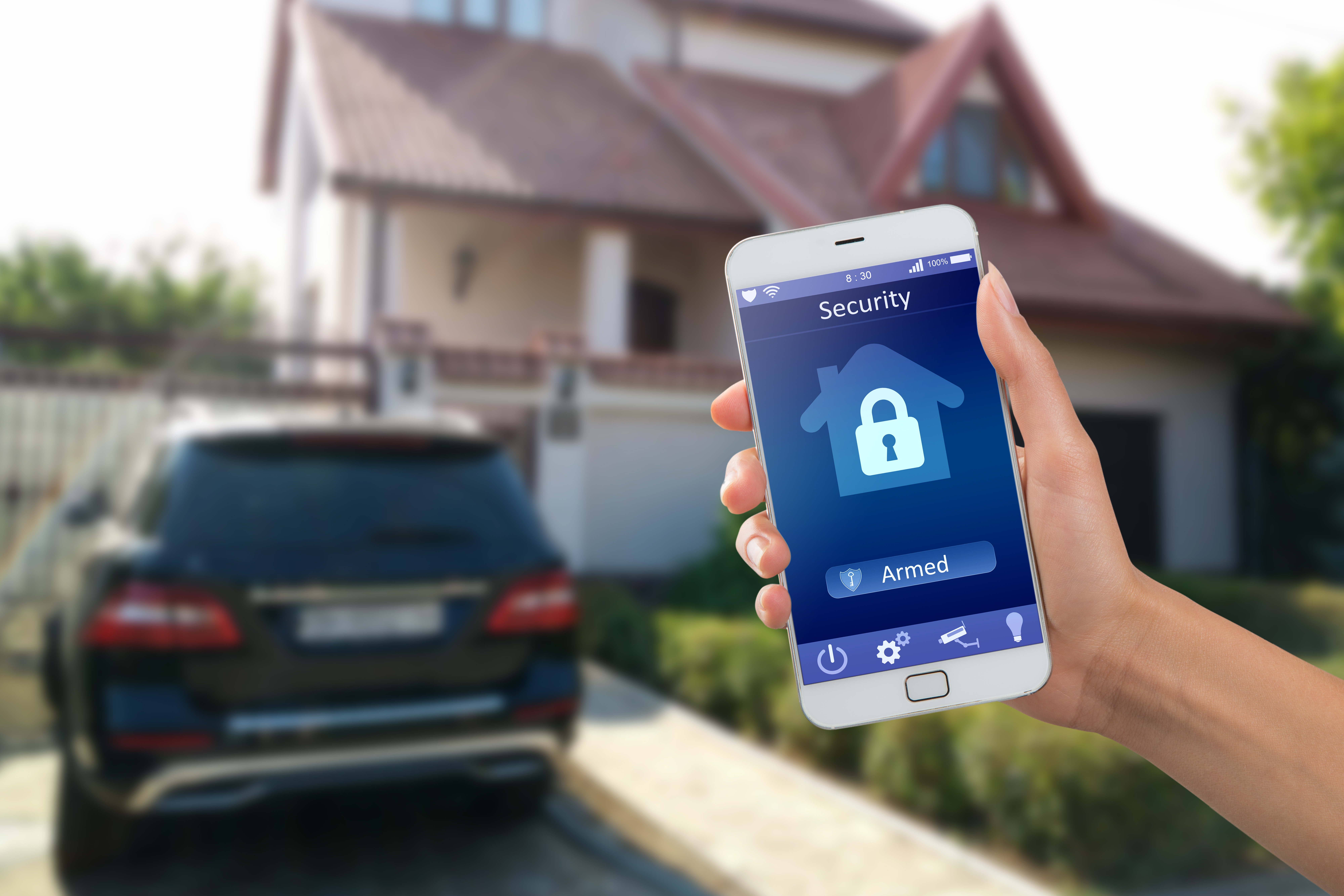 Person using a smart home security system