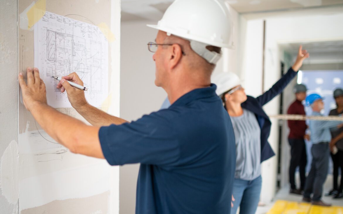 Retrofitting in action: Engineers draw up plans.