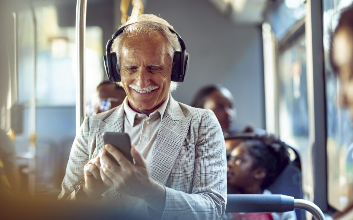 Senior man listening to music