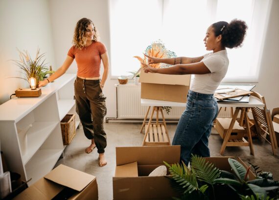 A young couple moves in together during moving season.