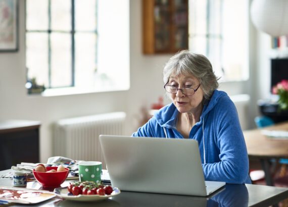 Senior woman using old tech