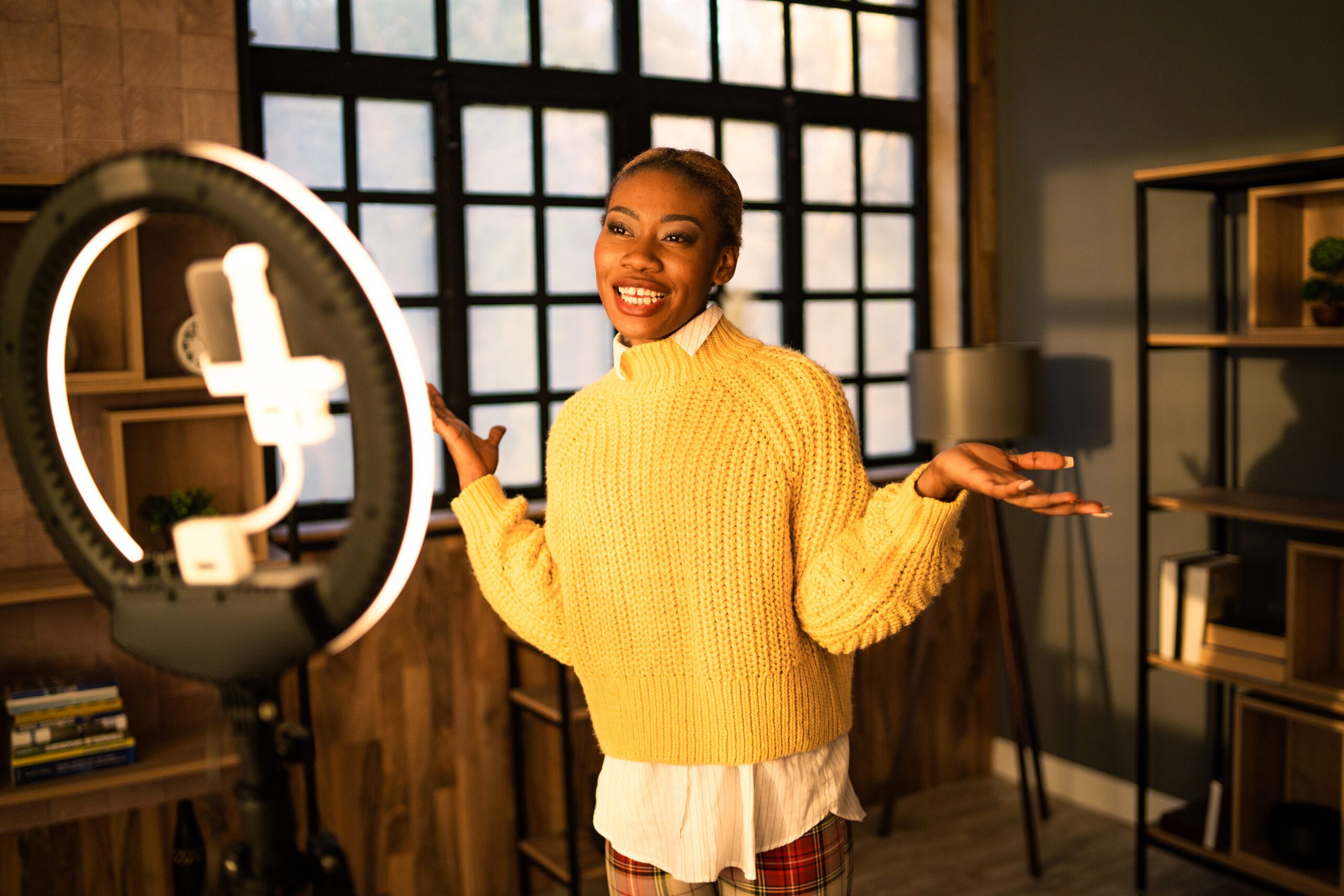 Small business owner using a ring light