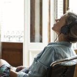 Woman learning how to stream music