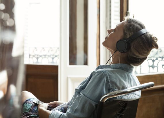 Woman learning how to stream music