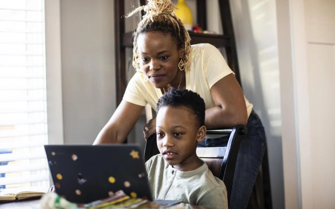 A mother and son enjoy WiFi 7 speed