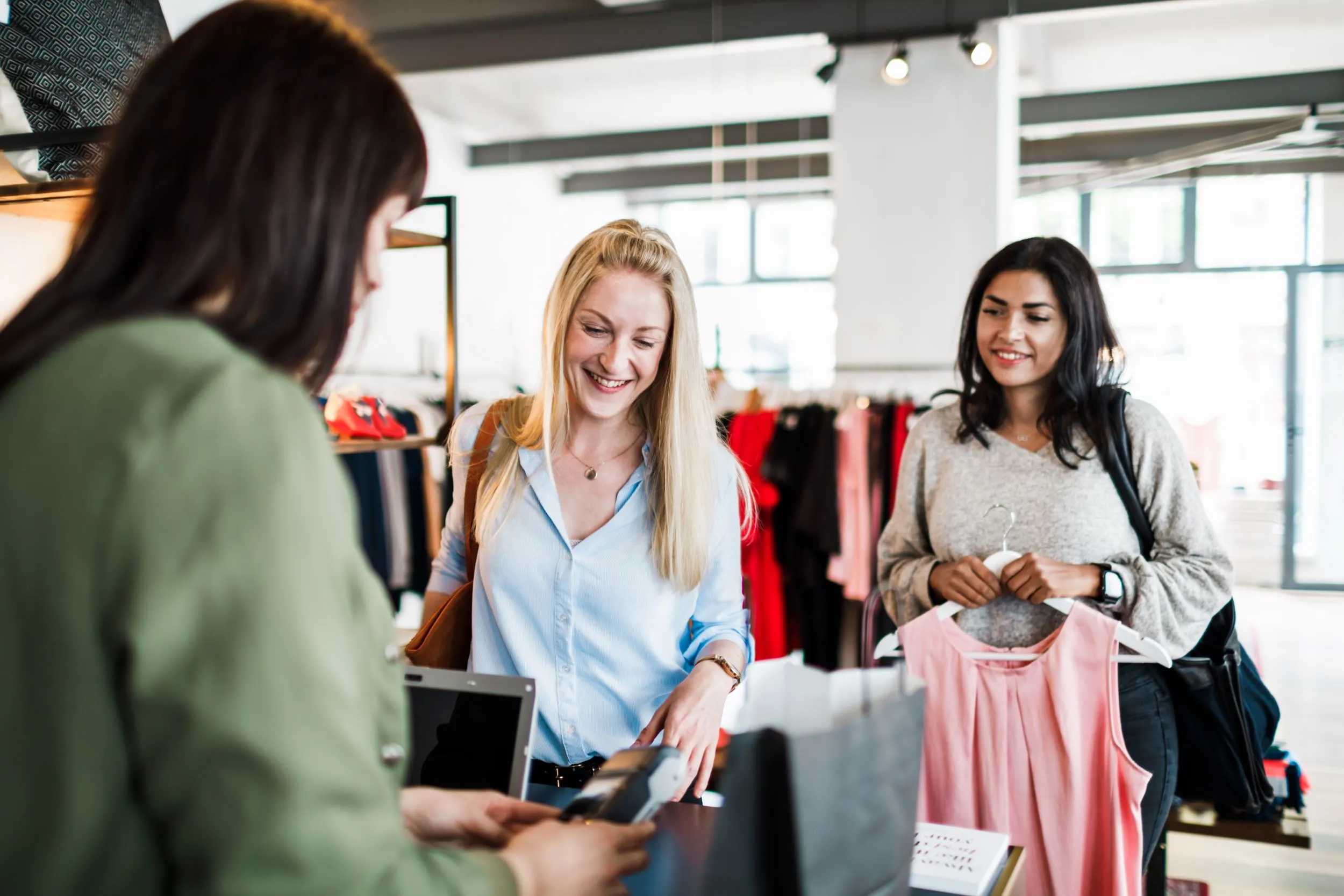 Customers checking out in a retail store