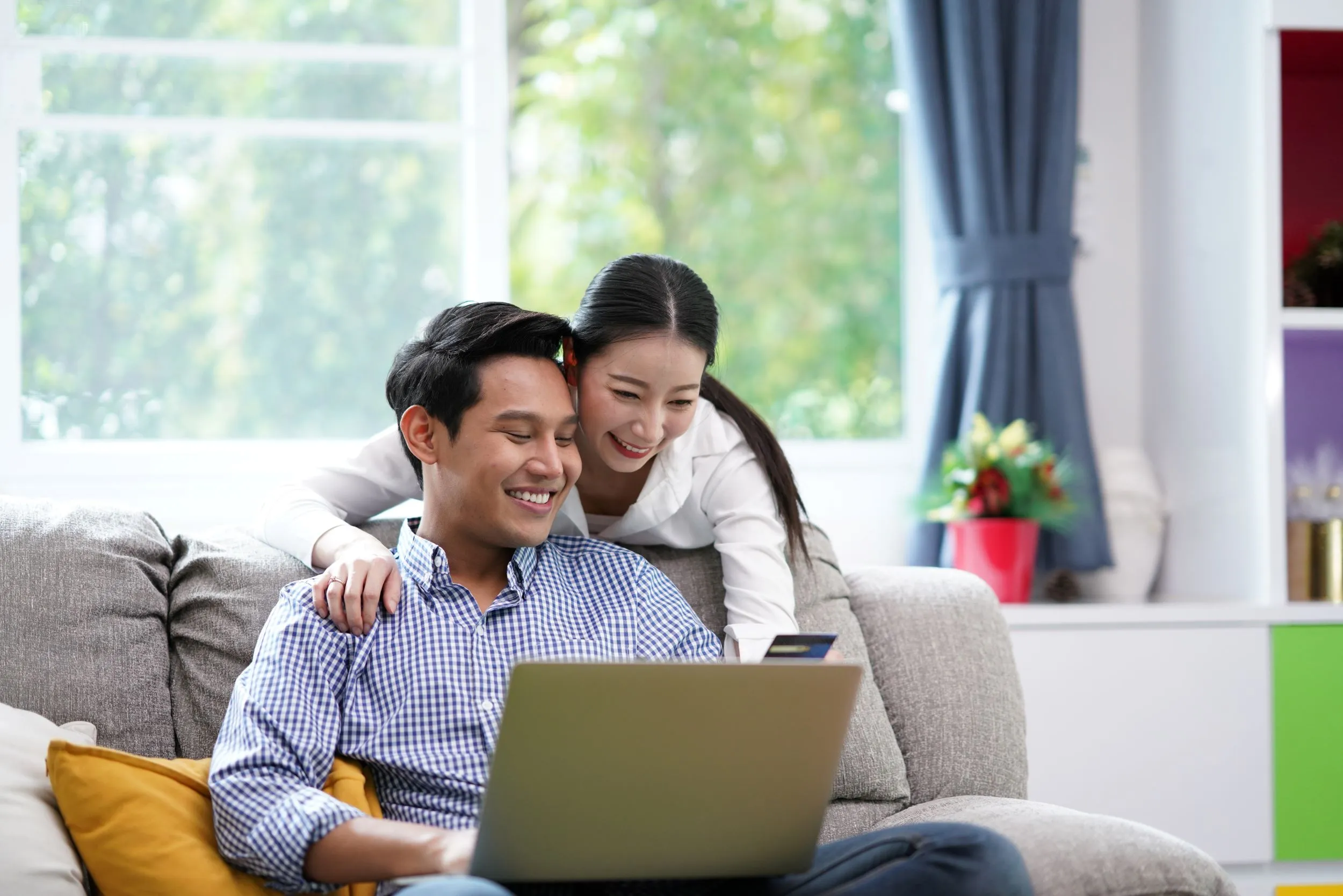 A couple using a password manager