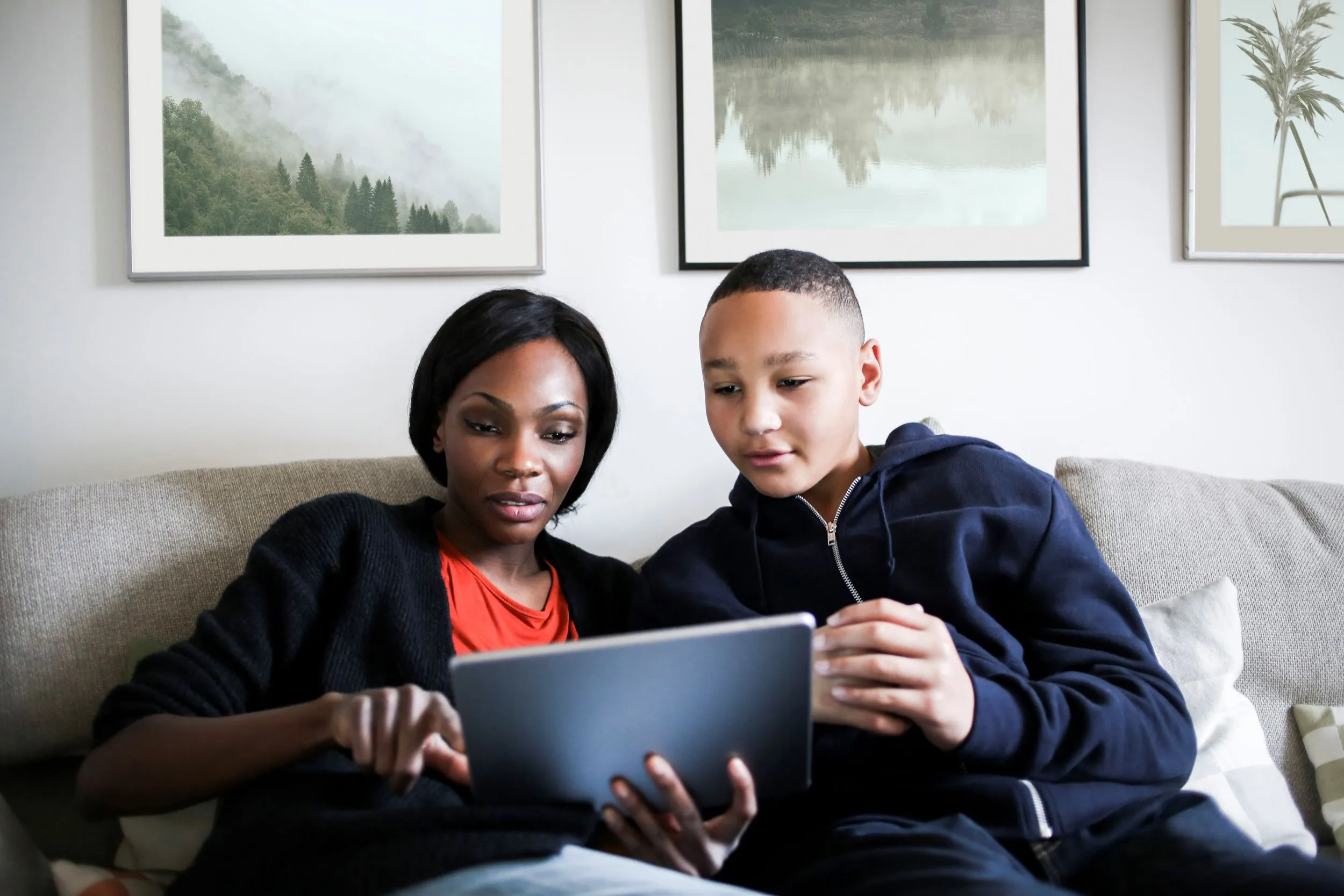 Mother and son going over online usage