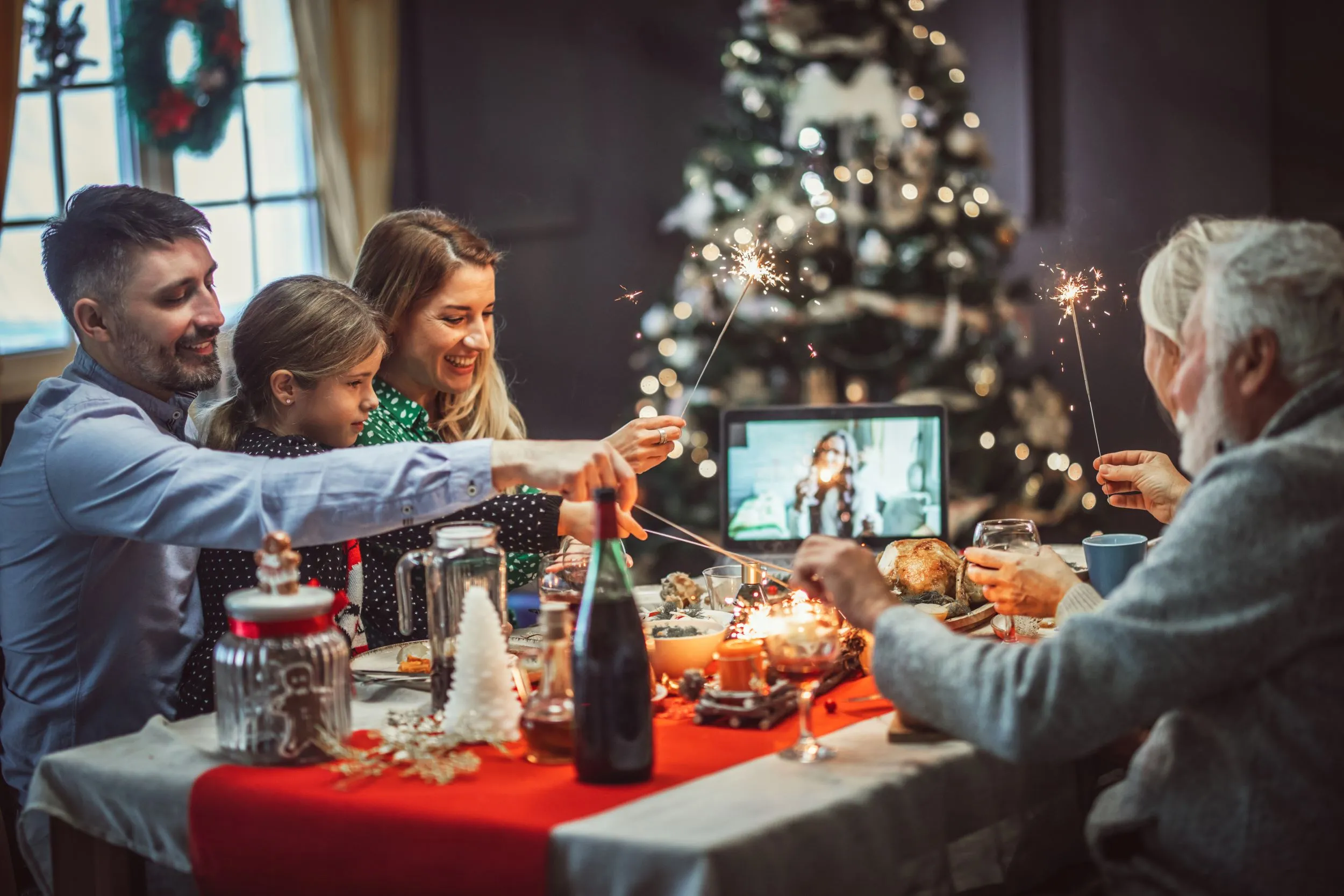 Family having a holiday virtual dinner