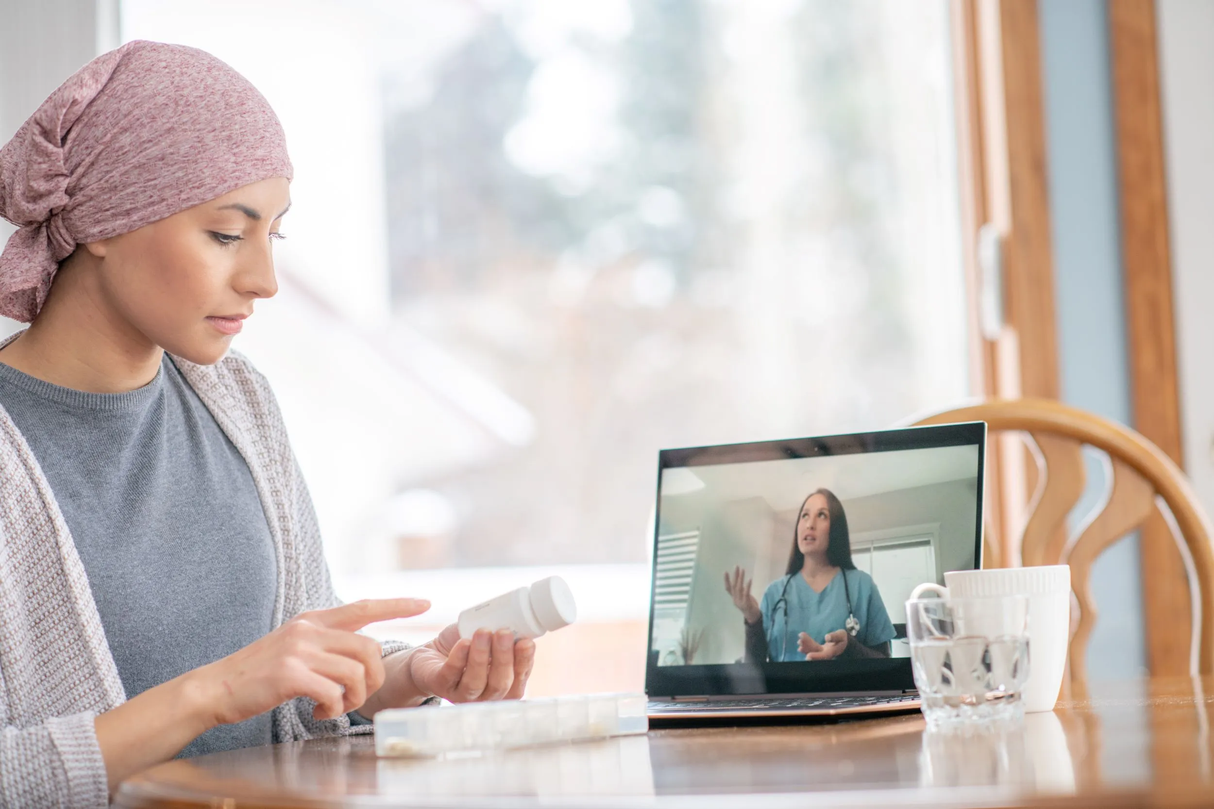 Breast cancer patient on a telehealth appointment at home