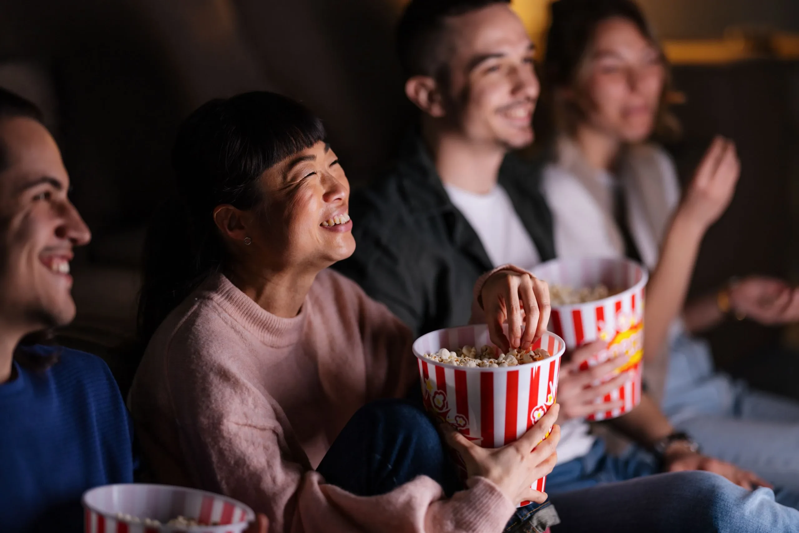 eating popcorn and watching a movie