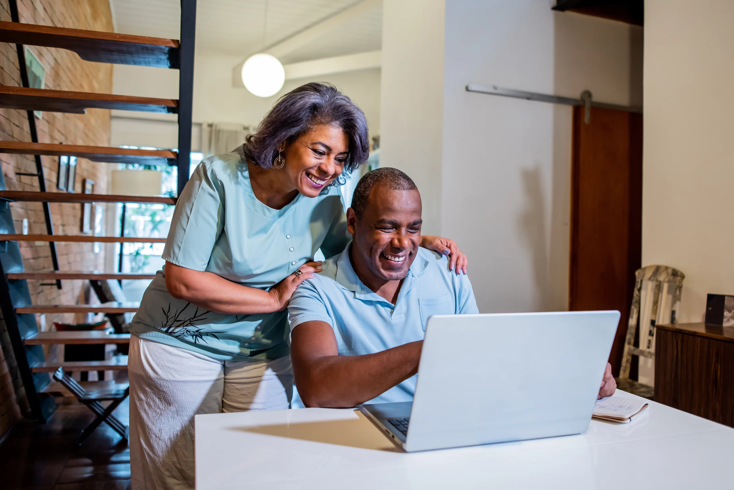 Senior couple looking at health data on website