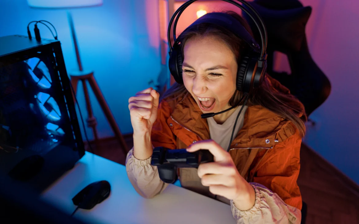 Girl winning a computer game