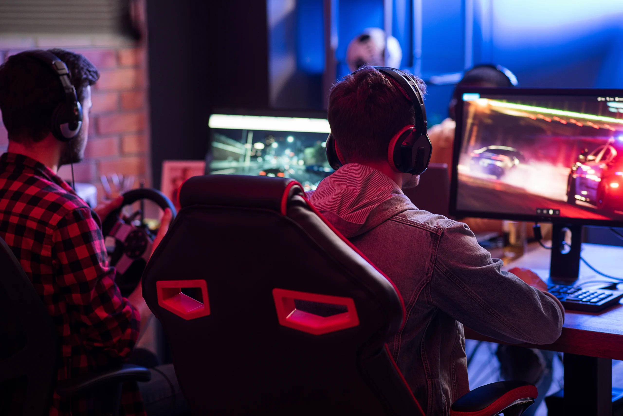 two-gamers-playing-on-computers