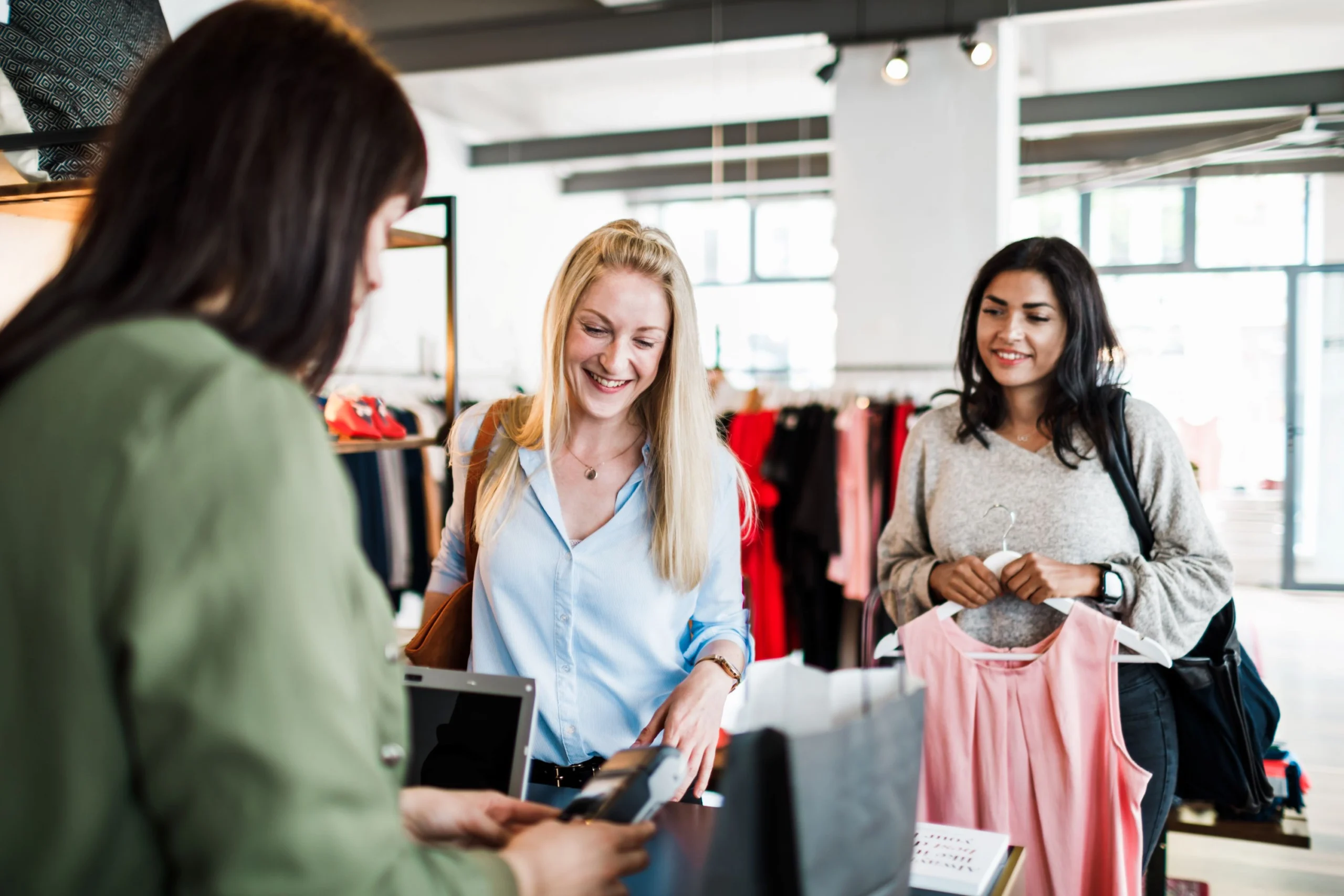 Women buying clothes in a store