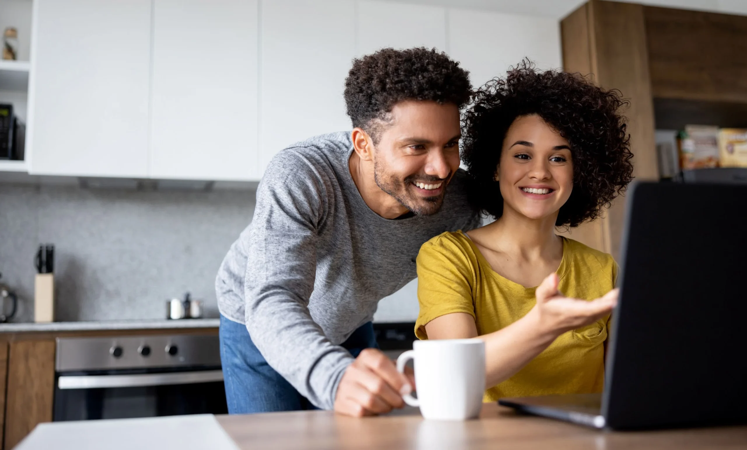 man-and-woman-looking-at-computer
