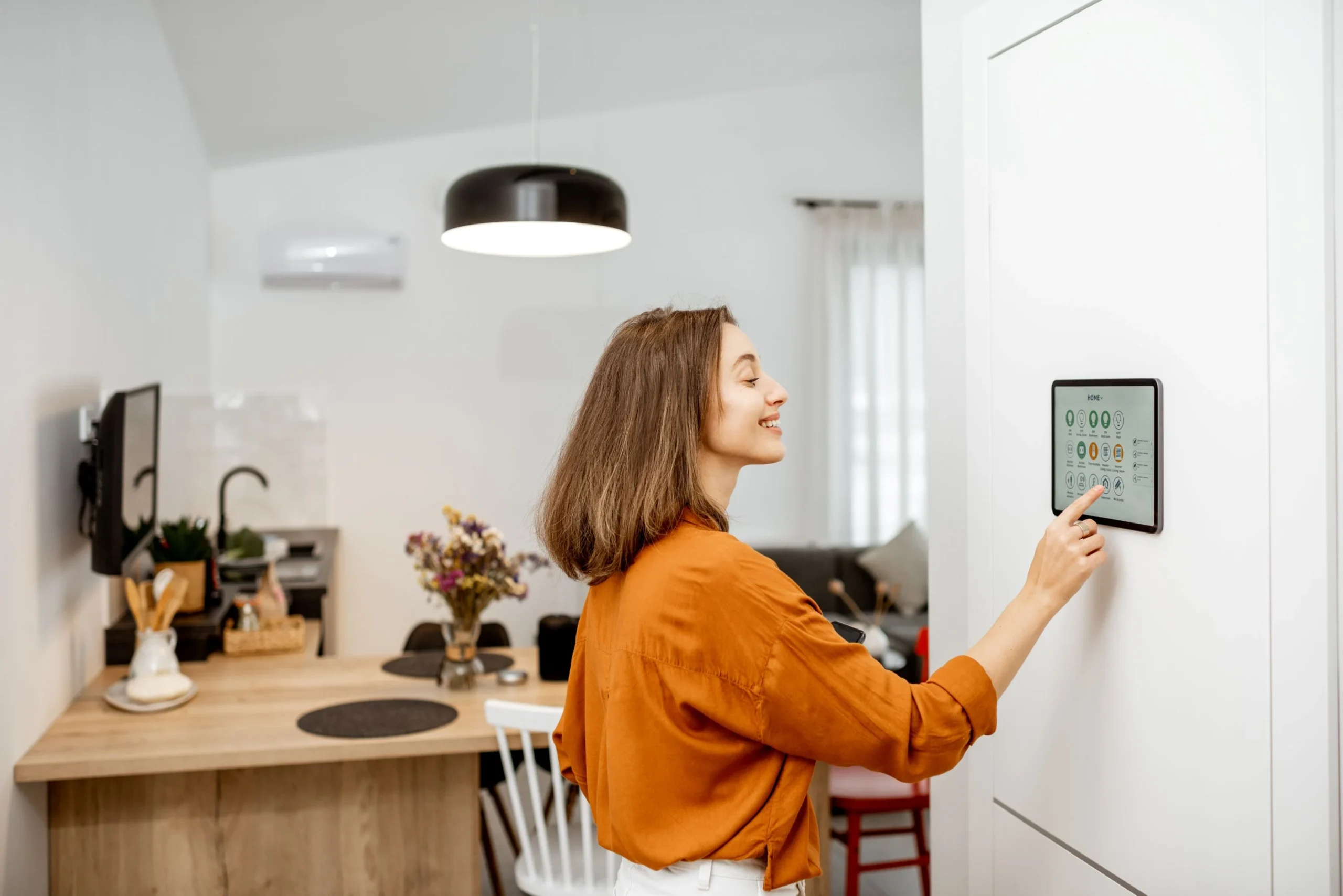 woman-using-smart-home-device