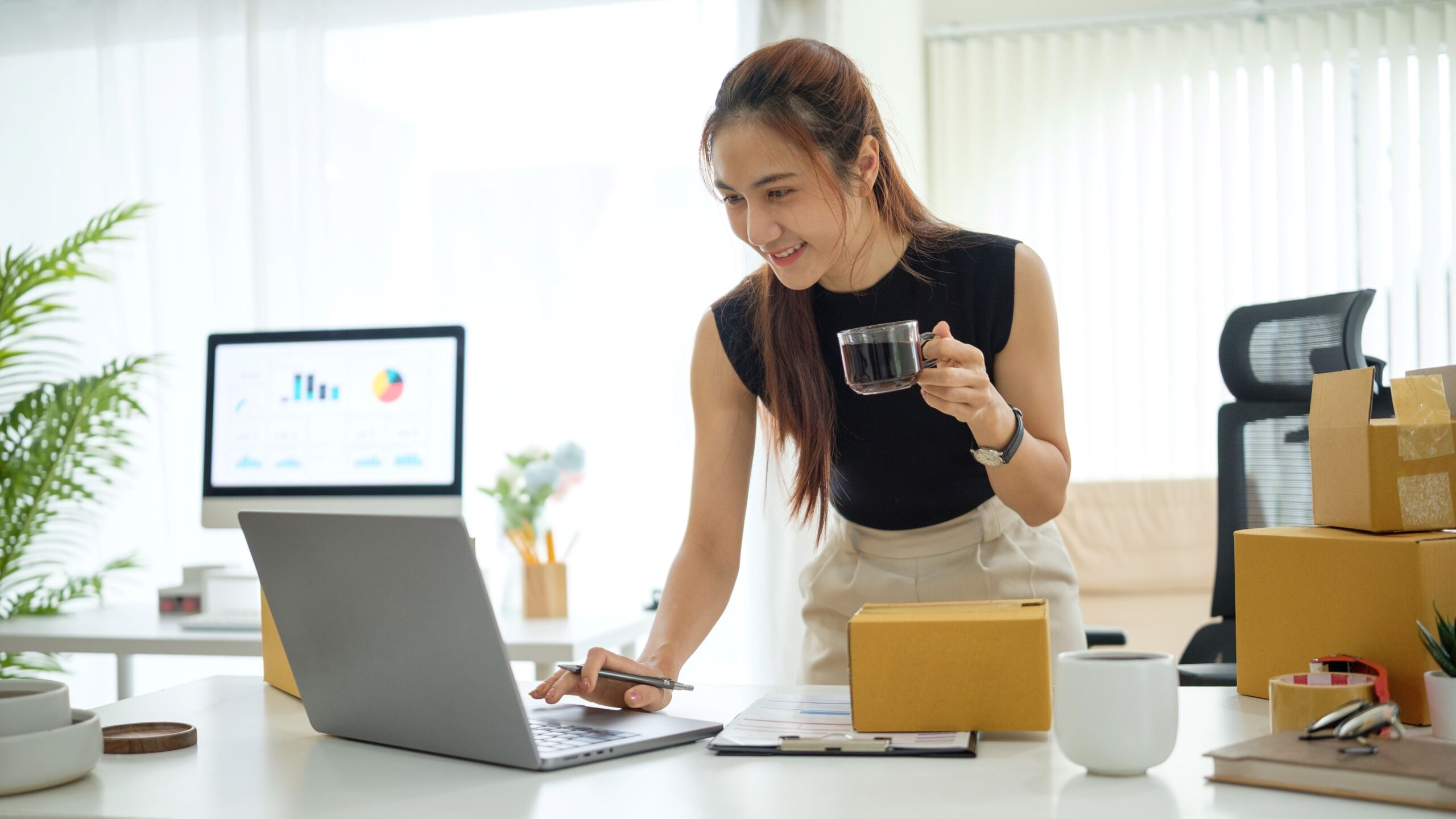 Small business owner using AI to help analysis anayltics Small business owner using AI to help analysis anayltics