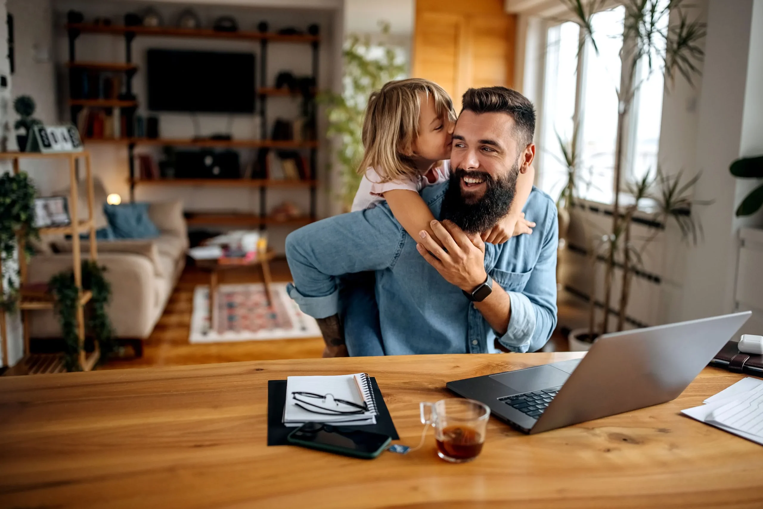 Father at desk with daughter