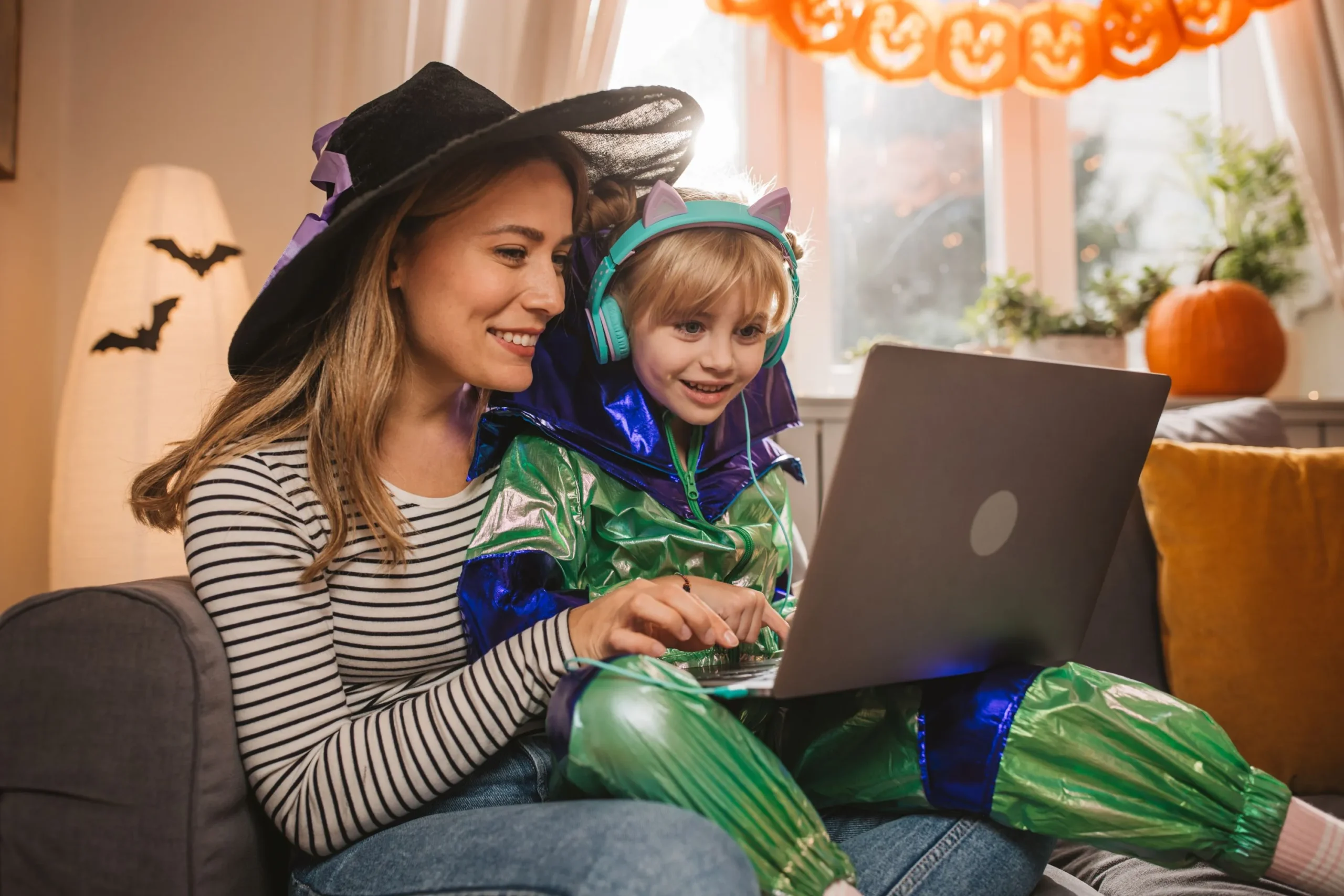 Mother with child on laptop